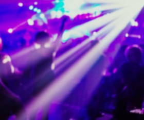 Nightclub Happy young man dancing in the background image blurred background