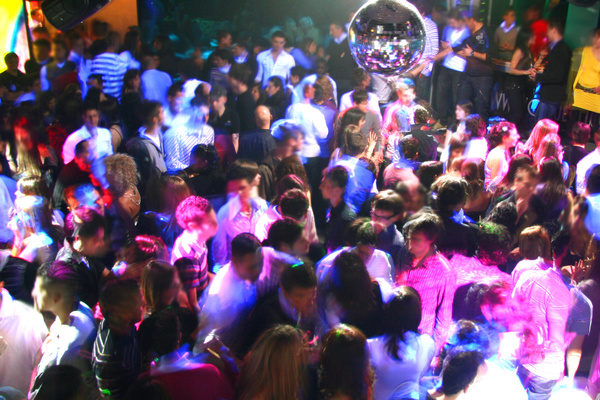Nightclubs accompanied by music, dancing people