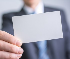People holding a blank business card with background blur 03