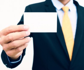 People holding a blank business card with background blur 04