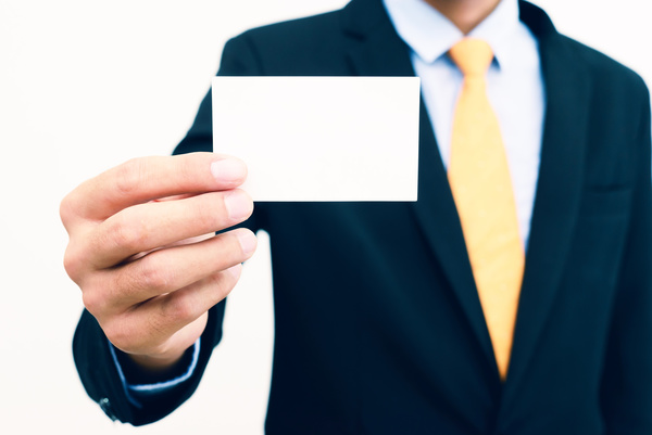 People holding a blank business card with background blur 04