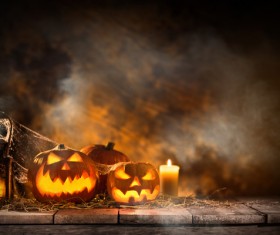 Pumpkin on old wooden table flame background Stock Photo 03