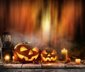 Pumpkin on old wooden table flame background Stock Photo 04