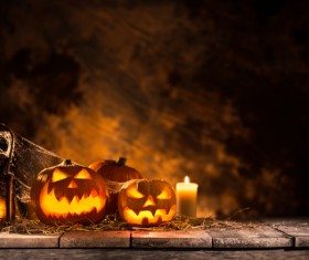 Pumpkin on old wooden table flame background Stock Photo 06