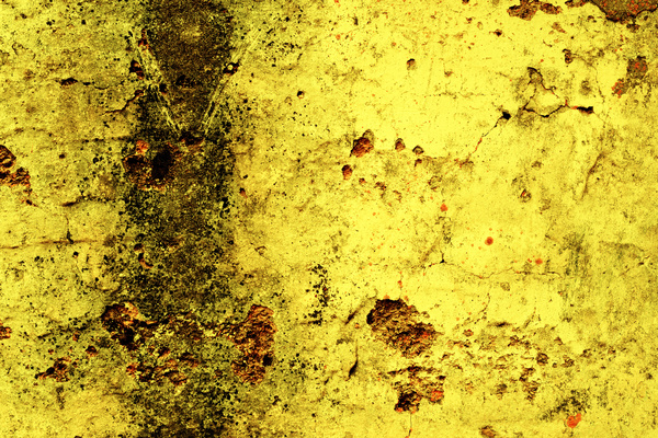 Scratched texture on yellow wall Stock Photo