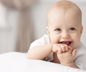 Smiling baby in front of the camera HD picture