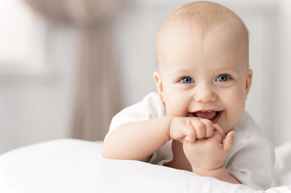Smiling baby in front of the camera HD picture