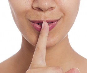 Smiling up the mouth and index finger