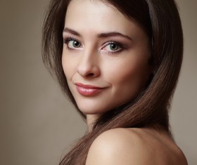 Smiling young beautiful woman with long black hair