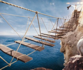 Stand in the open arms of the man on the bridge