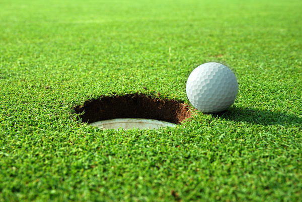 Stop in the hole golf Stock Photo