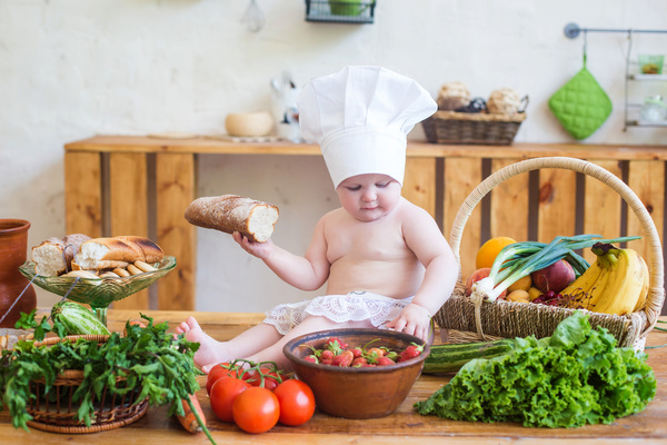 The cook costume Baby Bread and food Stock Photo