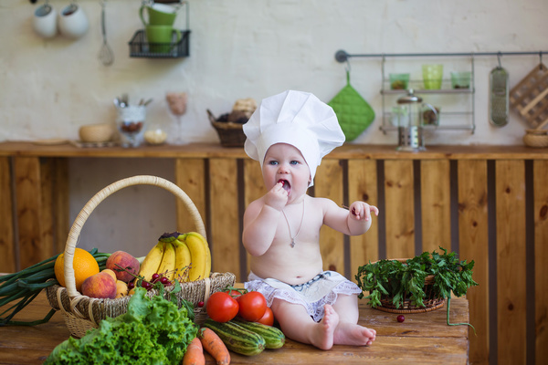 The cook costume Baby Bread and food Stock Photo