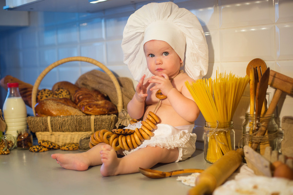 The cook costume Baby food Stock Photo
