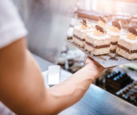 The pastry chef prepares the chocolate cake Stock Photo 01