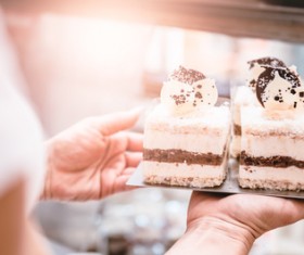 The pastry chef prepares the chocolate cake Stock Photo 02
