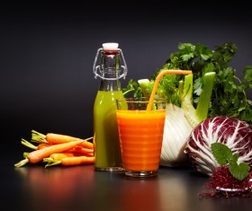 Vegetable juice and various vegetables Stock Photo