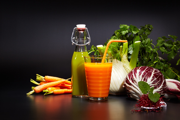Vegetable juice and various vegetables Stock Photo
