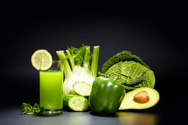 Vegetable juice on a black background Stock Photo