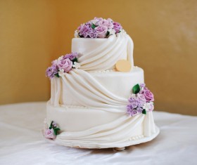 White cream cake and decorative flower