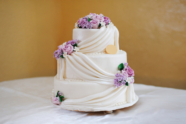White cream cake and decorative flower