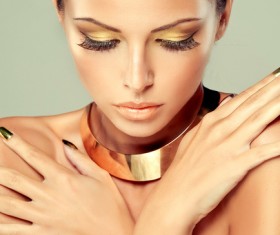 With a gold necklace fashion woman eyelashes beauty nail