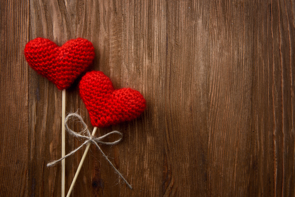Wooden walls on the heart of two Valentines Stock Photo