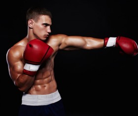 Young boxer with a black background Stock Photo