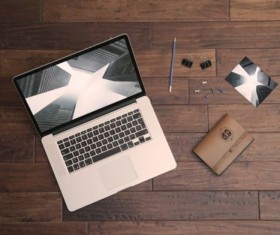 laptop Pro Mockup with wood floor psd material