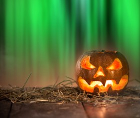 reen background with pumpkin lights