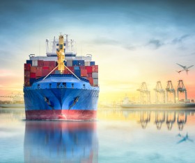 A ship loaded with cargo under the setting sun HD picture 01