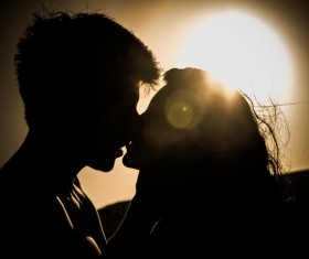 Sunset intimate couple Stock Photo