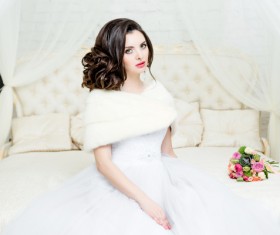 Beautiful wedding bride sitting on the bedside luxury Stock Photo 02