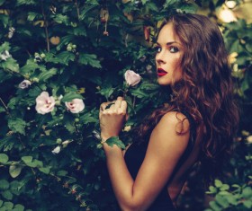 Beautiful young happy woman with garden HD picture