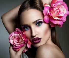 Beauty fashion model girl with flowers Stock Photo