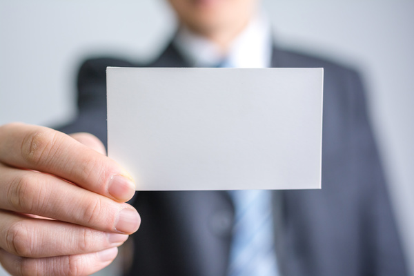 Business people with white card Stock Photo 01
