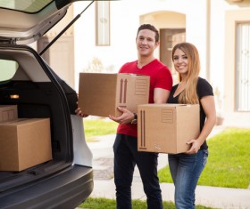Carry the box to the car Stock Photo