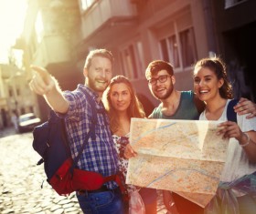 City map with the direction of the happy tourists