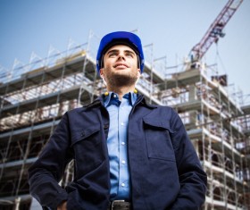 Construction workers behind the construction of the building