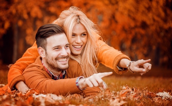 Couple in autumn park Stock Photo