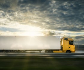Dark clouds Mercedes-Benz delivery trucks HD picture