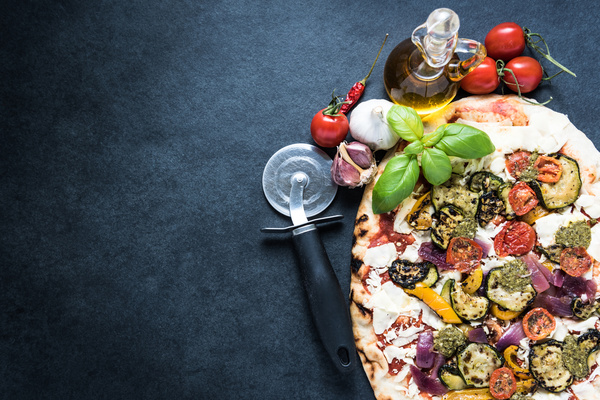 Delicious vegetable pizza with olive oil Stock Photo