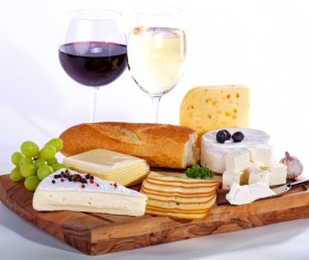Dinner board with wine and food Stock Photo