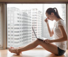 Eye massage notebook female Stock Photo