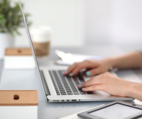 Female business people using laptop Stock Photo