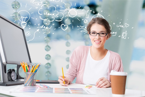 Full of ideas Young female graphic designer Stock Photo