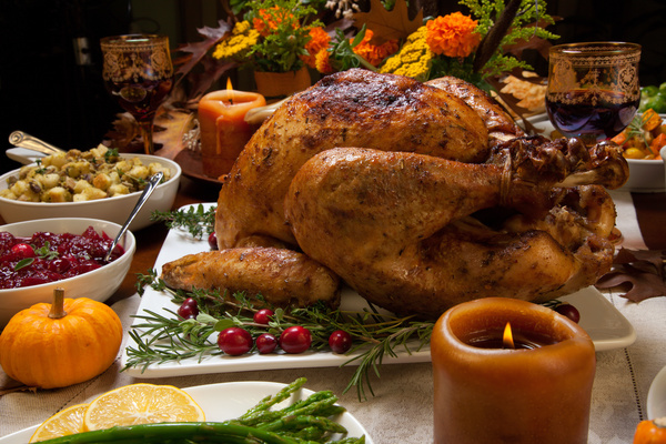 Grilled turkey and candles on the Thanksgiving table Stock Photo free ...