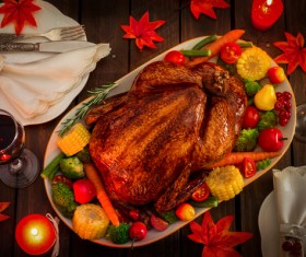 Grilled turkey and tableware on the Thanksgiving table Stock Photo