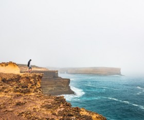 HD picture Standing on a rock on the beach