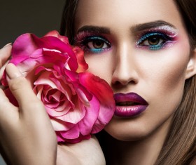 Hand holding the beauty of fashion models girl flowers